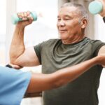 Medical,,Training,And,Physiotherapy,With,Dumbbell,And,Old,Man,With