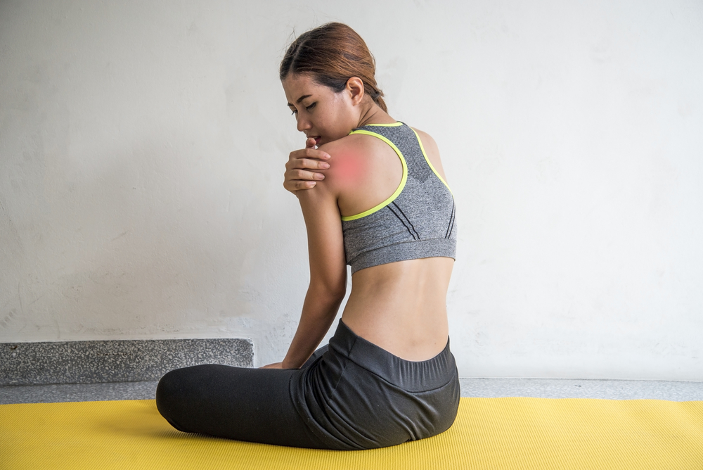 Woman,With,Shoulder,Pain.,Healthcare,,Medical,And,Sickness,Concept